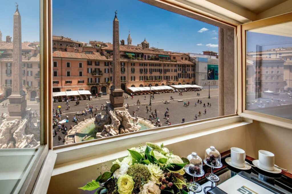 View of Piazza Navona through the window of the hotel room.