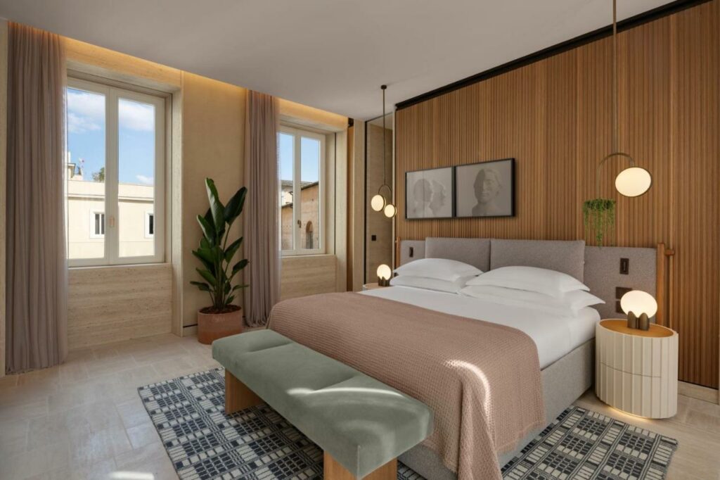 A sustainably designed room of Hotel Six Senses Rome with double bed.